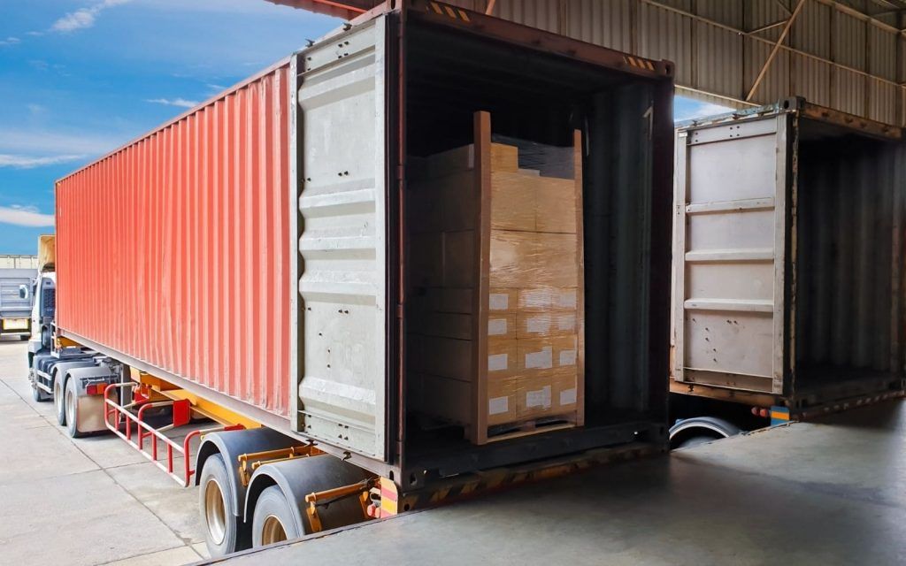 the-truck-trailer-container-docking-load-shipment-goods-pallets-at-warehouse-freight-industry-logistics-and-transport-1